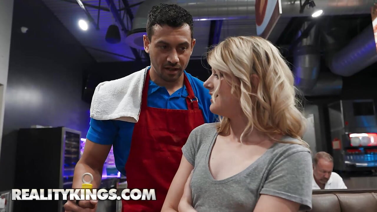 REALITY KINGS - Dez Hansen Serves Up A Sexy Public Hookup Between Booths And Tables