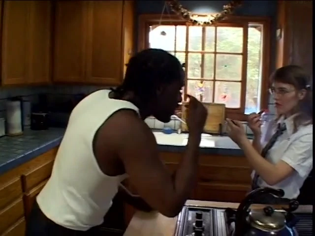 Hot young brunette takes a load on her glasses after getting fucked