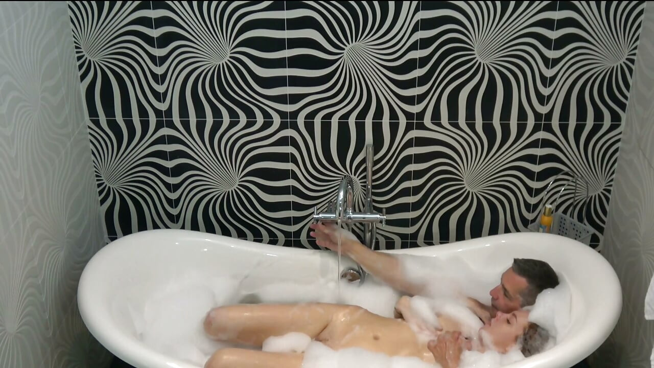 Naughty teen gets banged by her stepdad in the bathtub