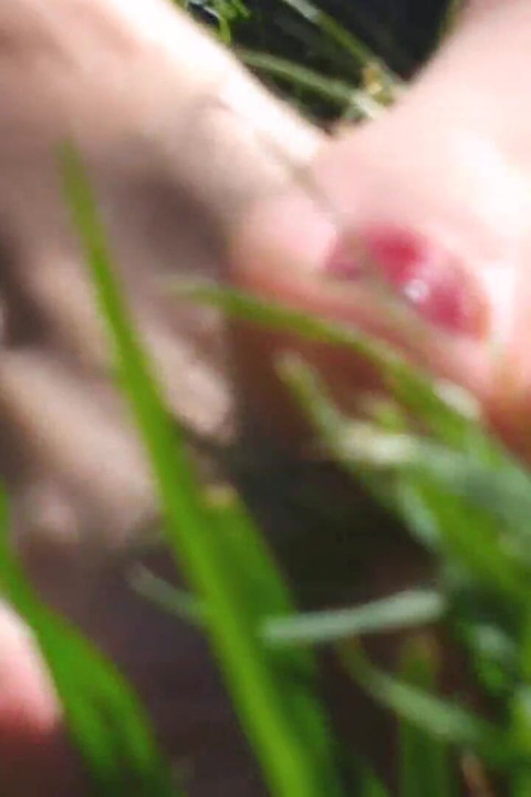 Nyllady Walking Barefoot on Th Grass in a Park