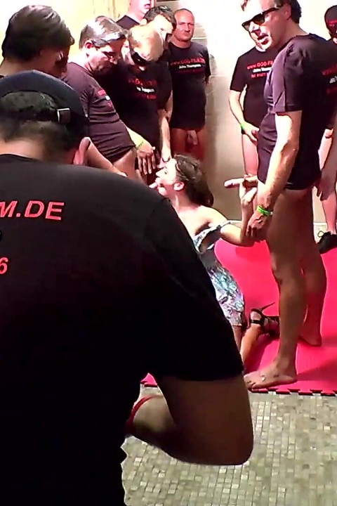 Bukkake Slut Gets Her Face Drenched by a Massive Crowd