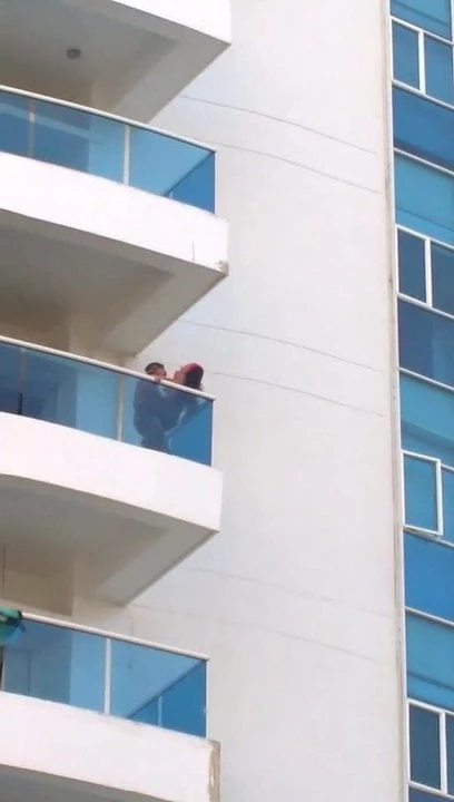Couple fucking on balcony
