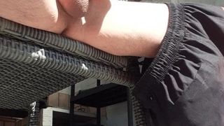 Playing on kik with my cock outside in the sun
