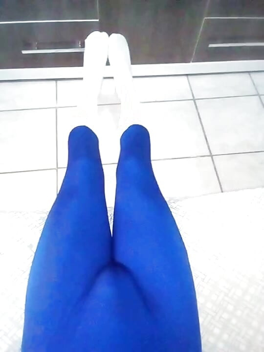 Fun at home wearing a blue Zentai costume with socks