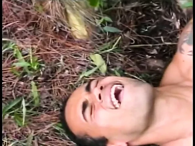 Young Latino gets drilled by a gay stud lying on a tree trun