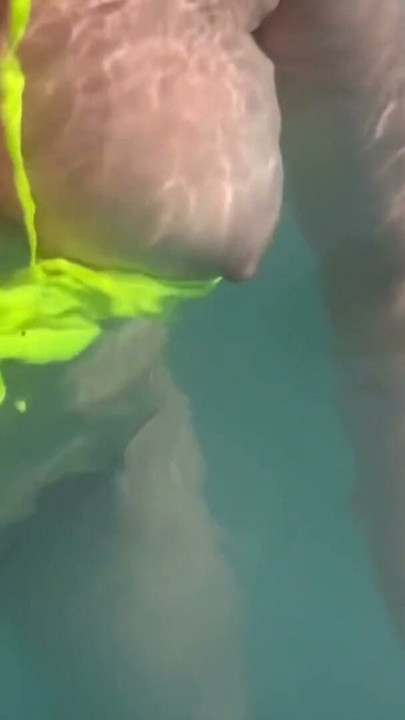 Artemisia Love flashing her juicy big tits underwater for you wearing a sexy bikini | Clip 1