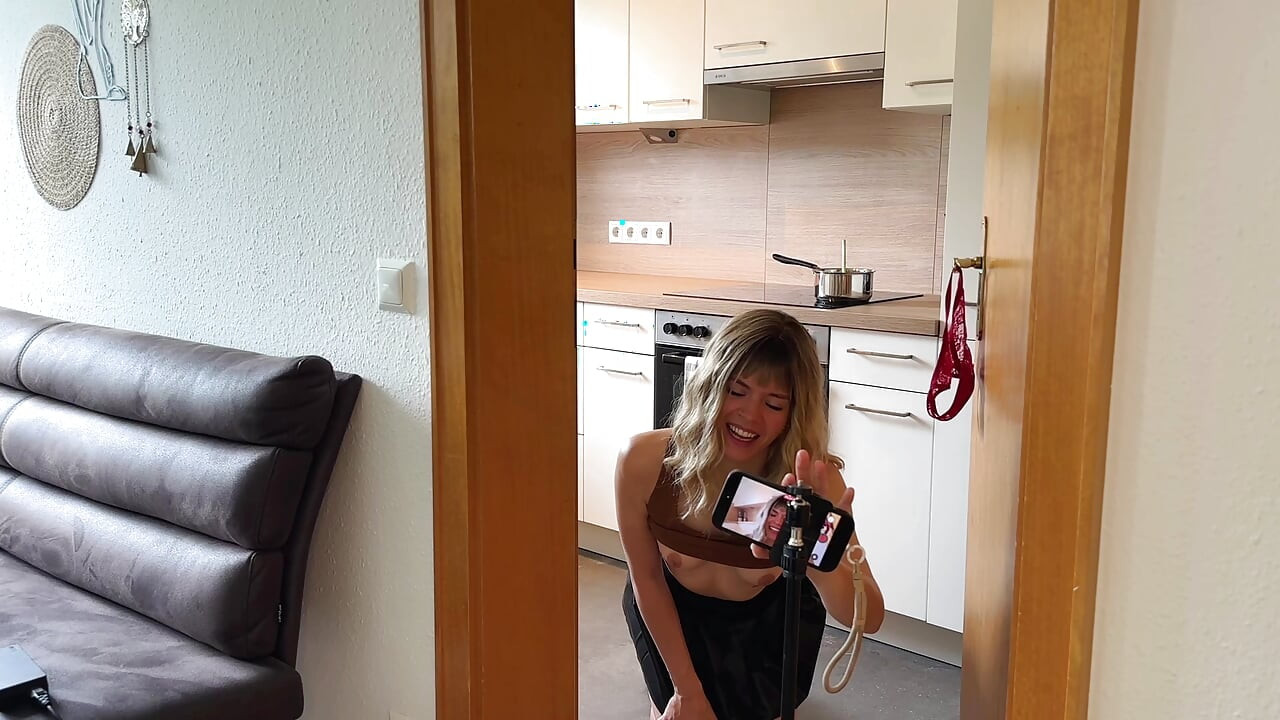 Leather skirt in the kitchen! neighbor tests hard wood behind the stove....