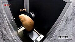 Spy hidden camera in a men's public toilet. Peeping