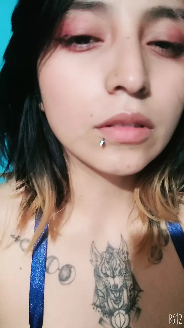Tattooed brunette