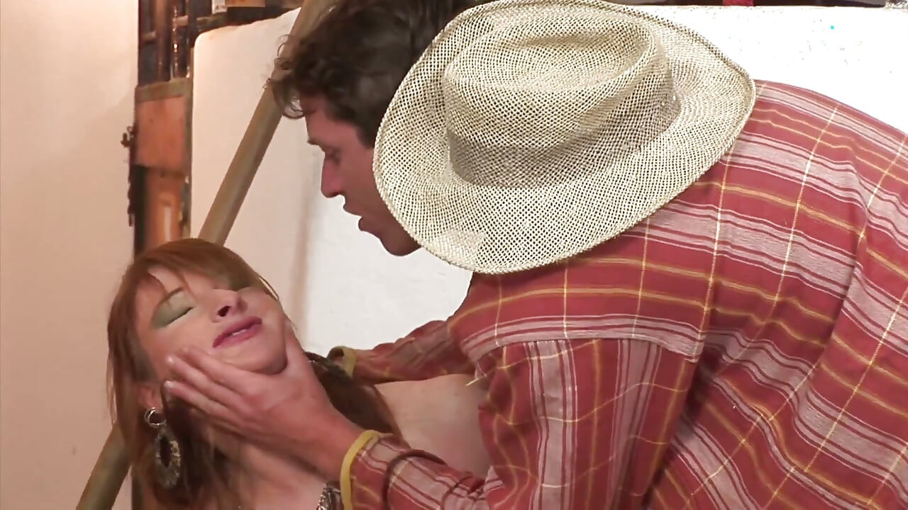Redhead whore with big tits gets fucked by a cowboy like old times in a barn