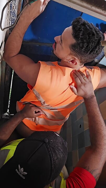 Construction Site Bathroom and Workers