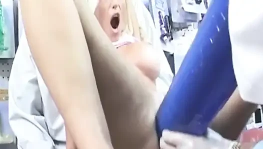 Blonde MILF Rams Massive Toys Deep During Medical Exam