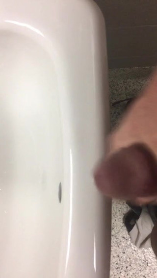 Masturbating in a public restroom