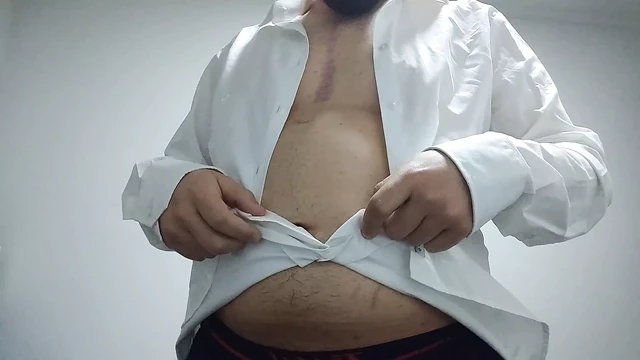Chubby guy take off his clothes and play with his cock