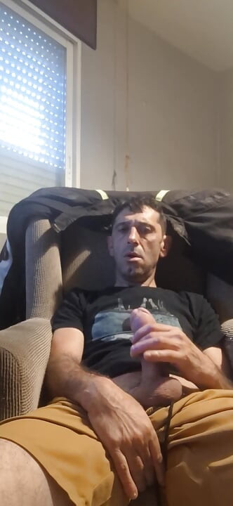 Guy masturbating on the sofa