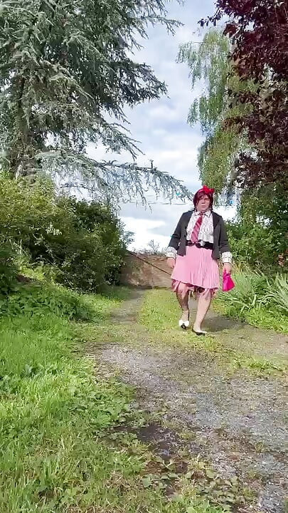 Dressed in a little pink pleated skirt for an evening out
