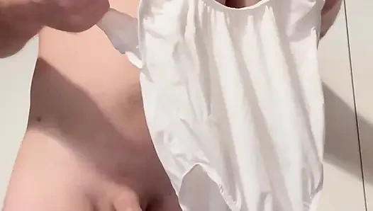 Trying on male athlete bodysuit