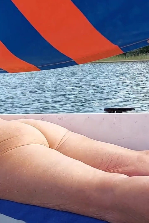 A Mature Woman, Completely Naked, on a Sailboat!
