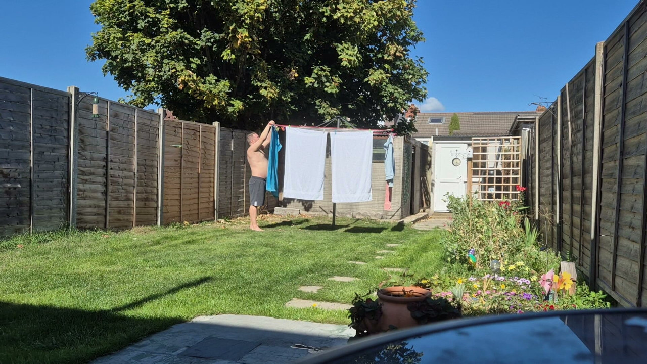 Dared to hang up clothes on washing line