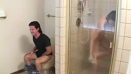Fellow was sitting on the chair and became very lusty watching the girl in the shower