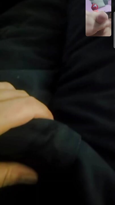 Lovers masturbating each other