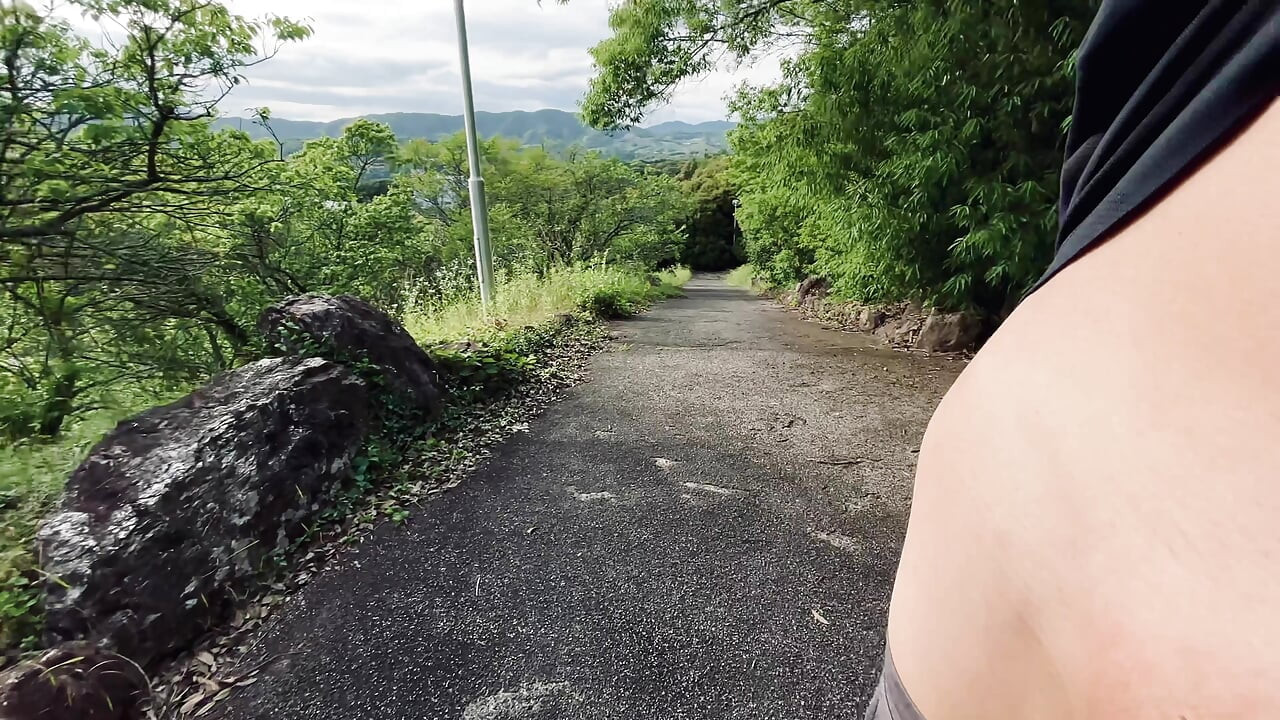 Asian twink riskily flashes his foreskin penis in a public park