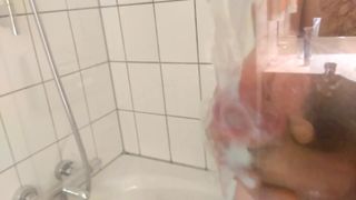 cumshot against glas in hotel bathroom, not shaved