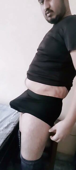 The cock is standing in the underwear.