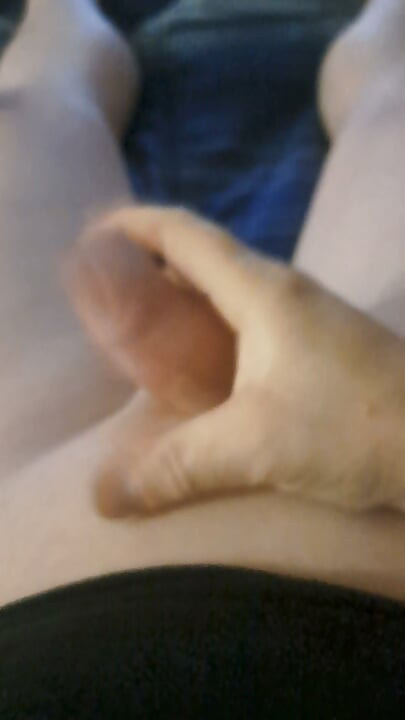 Masturbating