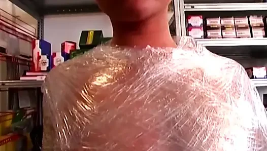 Plastic Wrapped Slut Gaping Wide Through Shiny Film