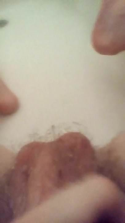 Masturbating