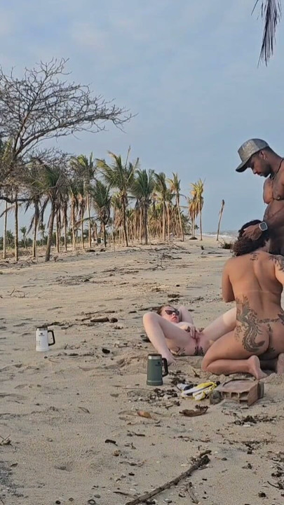 TWO LESBIAN CHICKS PLAYING ON THE BEACH GOT PICKED UP BY A TOURIST AND HAD THEIR ASSES FUCKED | Clip 1