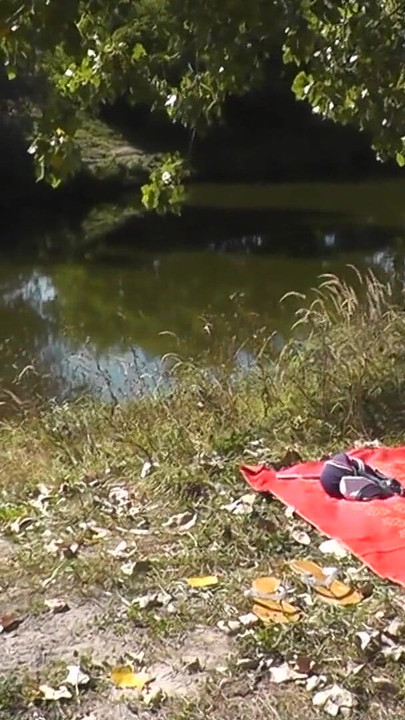 Captivating moment from "Outside, nature, by the river, naked MILF has wild masturbation"