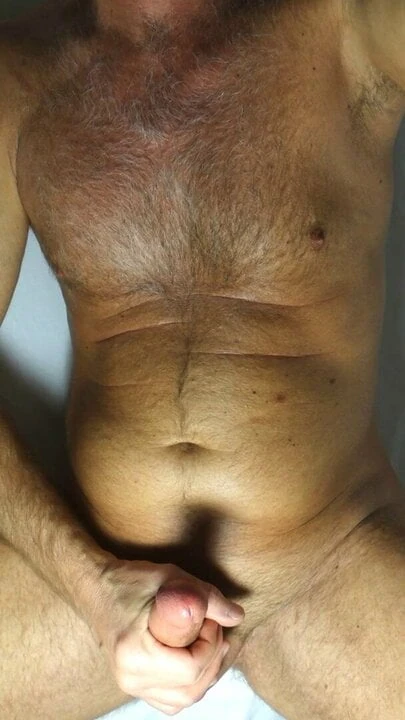 Showing my hairy chest and hard cock