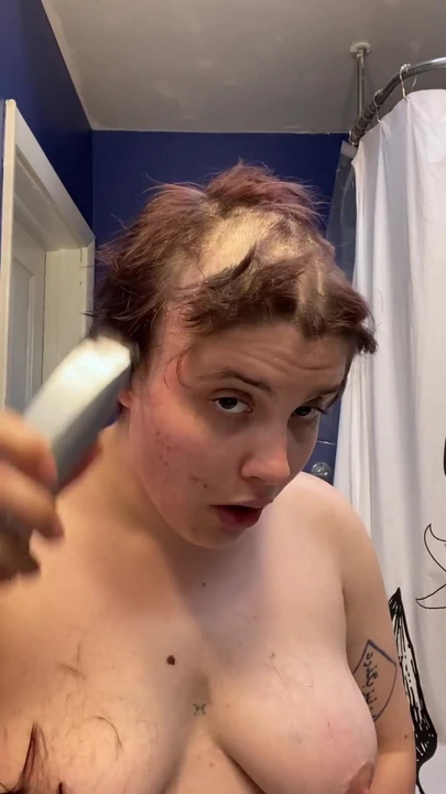 Iconic moment from "Hairless Whore - Adama Daat Amateur Fetish Head and Brow Shave"