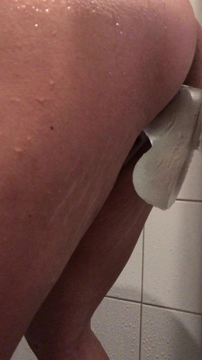Horny girlfriend takes dildo in shower