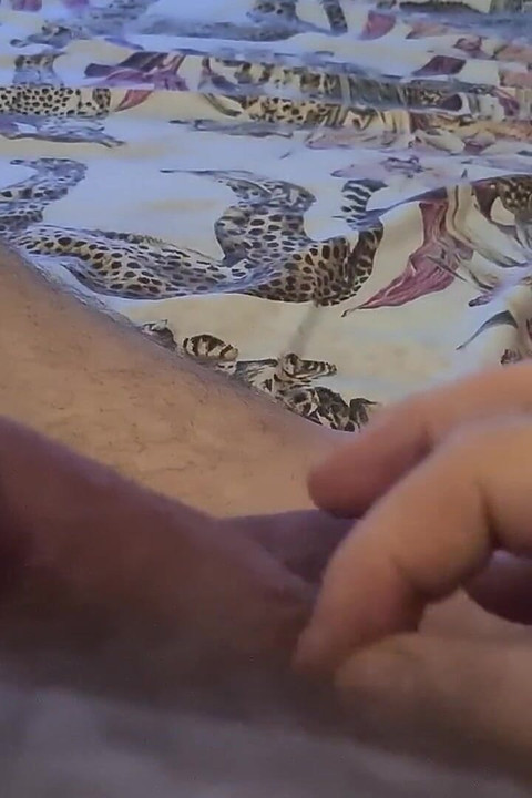 Grandpa Plays with His Cock While Watching a Movie