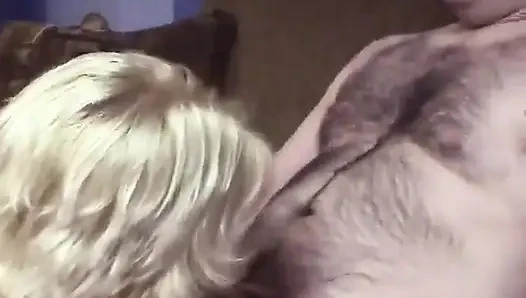 Blonde girl gets bent over the couch and gets fucked by a geek