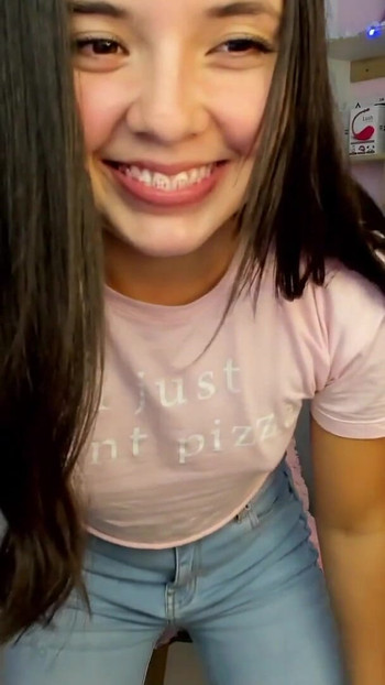 Emotional moment from "Beautiful Colombian with an angelic face has a vibrator inserted into her wet and tight pussy, while"