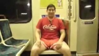 Guy showing off in a train