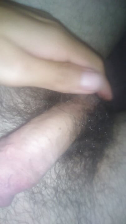 Man grops his cock under the covers