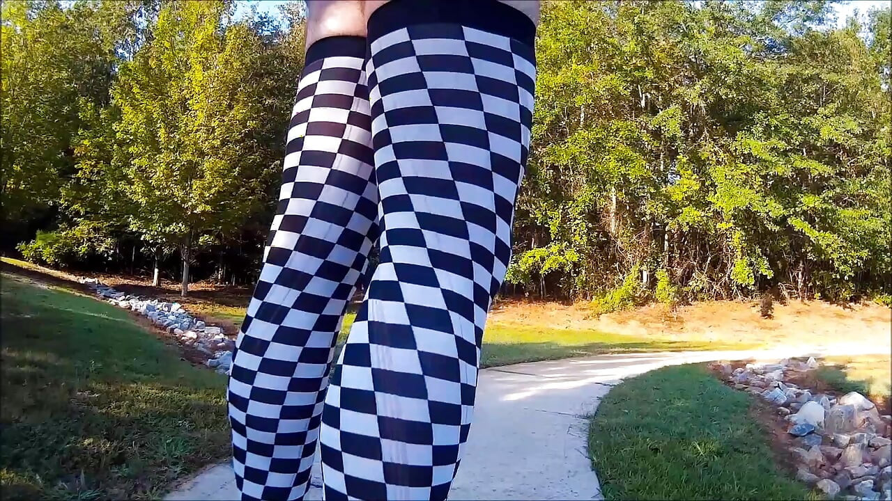 Crossdresser Walking in a public park in high heels