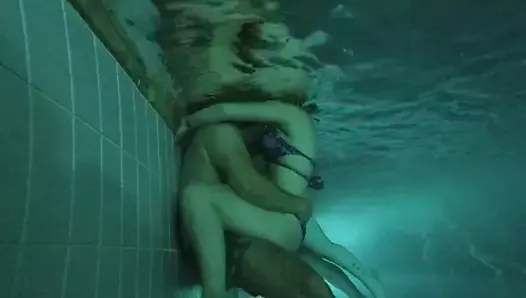 Couple at it in the pool