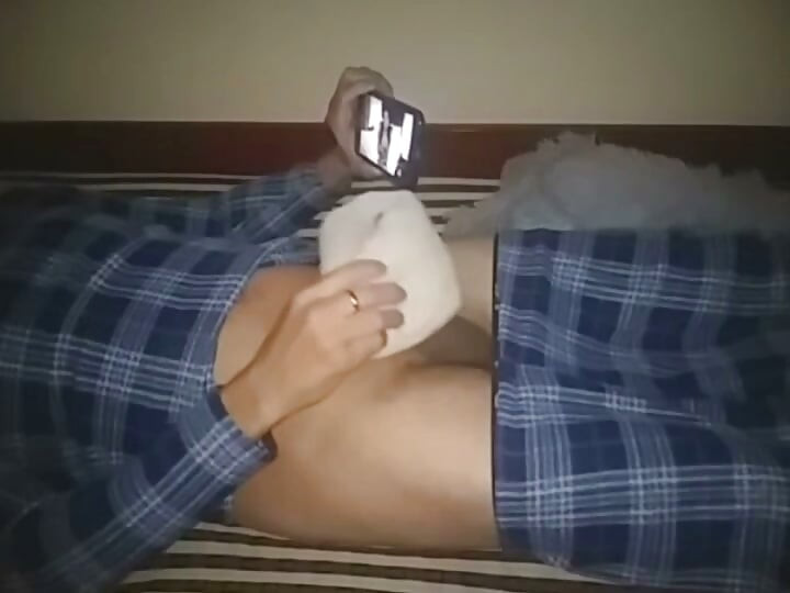 Jacking off while watching a video of my girlfriend.