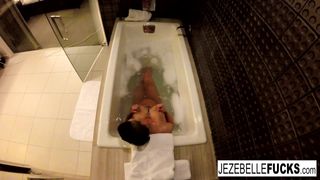 Jezebelle Bond films herself taking a bath