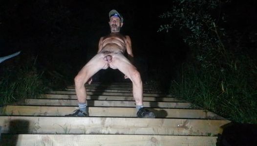 Guy posing naked outside