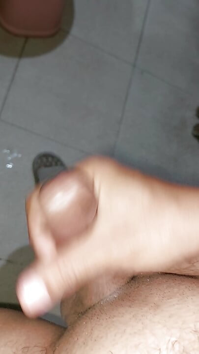 Jerking in the bathroom