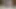 Zenci kız bulaşıkları yıkarken ayaklarını gösteriyor
