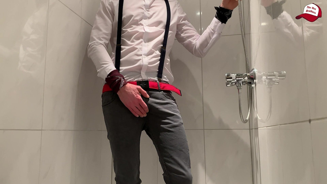 Wet gentleman clothes, white and shiny, wet jeans