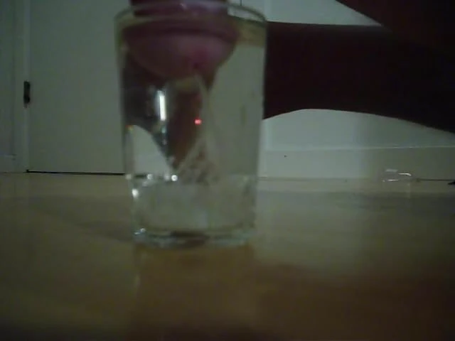 Cumshot in glass of water